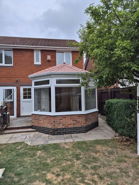 Completed home improvement project viewed from the garden